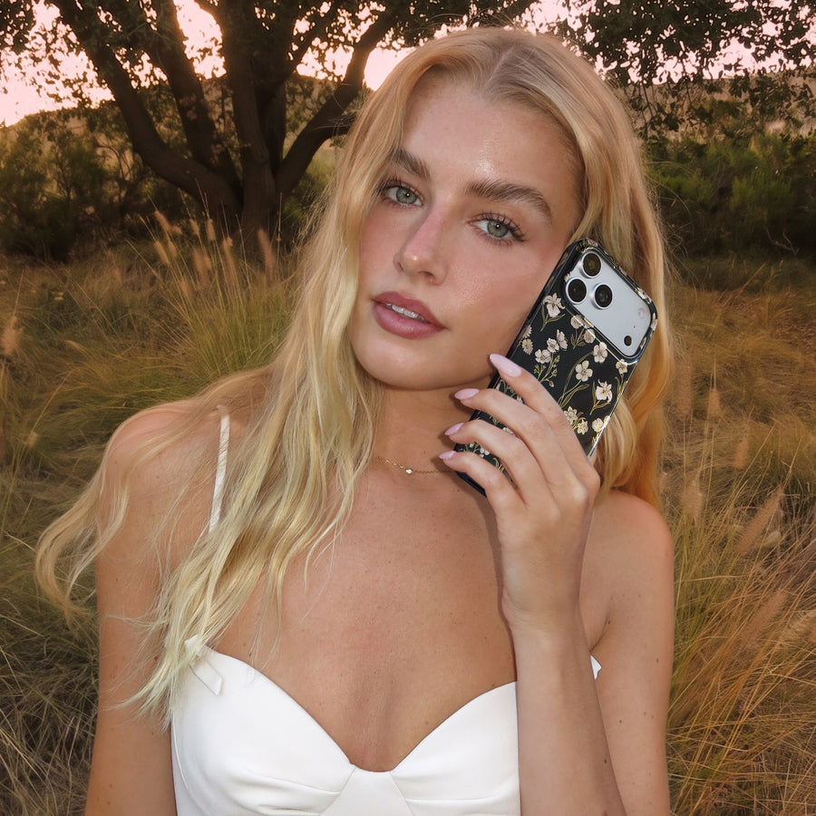 Nightbloom Gold Chrome Floral iPhone Case lifestyle